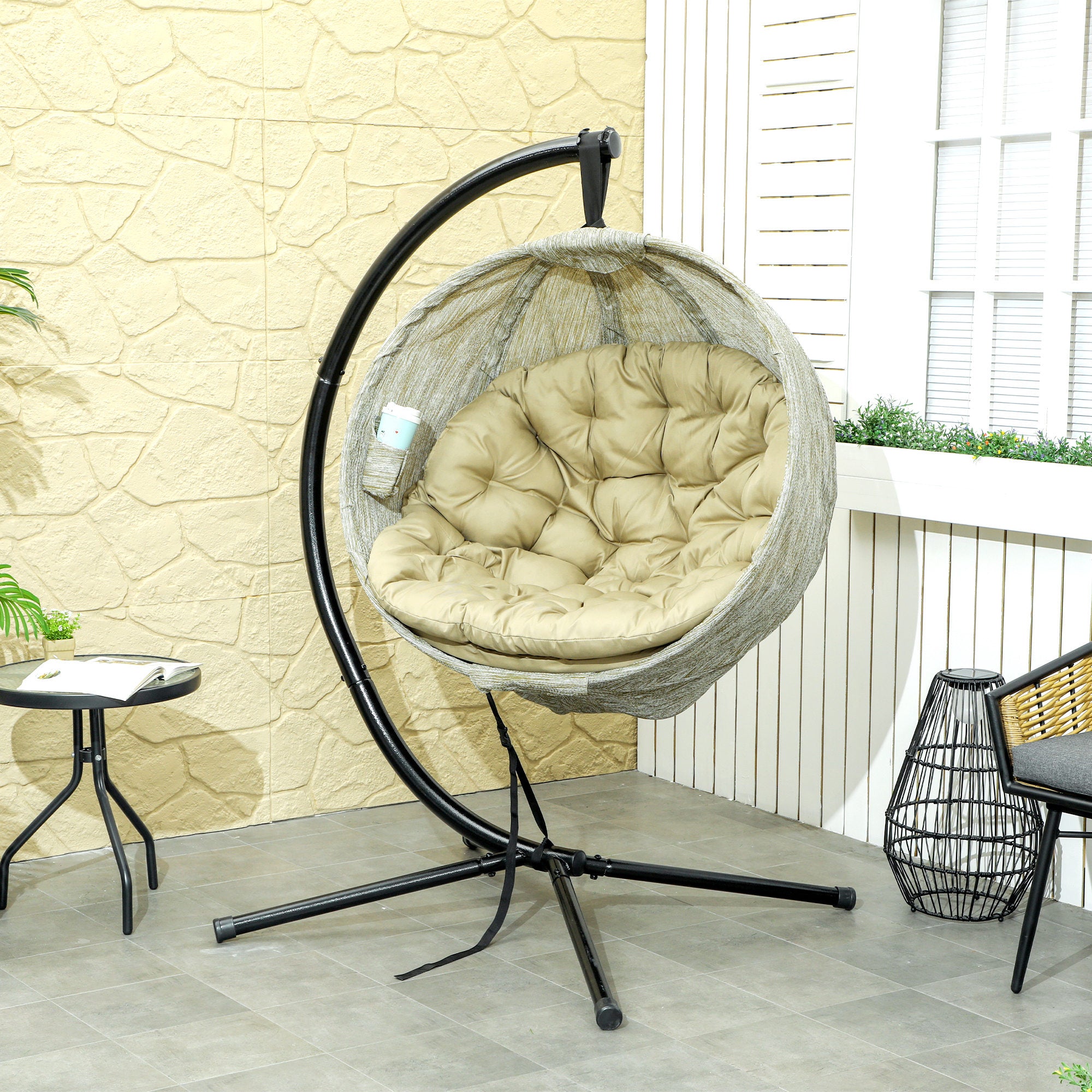 Outsunny Hanging Egg Chair Outdoor Indoor Garden Swing Chair with Folding Basket, Garden Hanging Chair with Stand, Thickened Cushion, Cup Holder for Patio, Balcony, Khaki - North Peak Garden Furniture