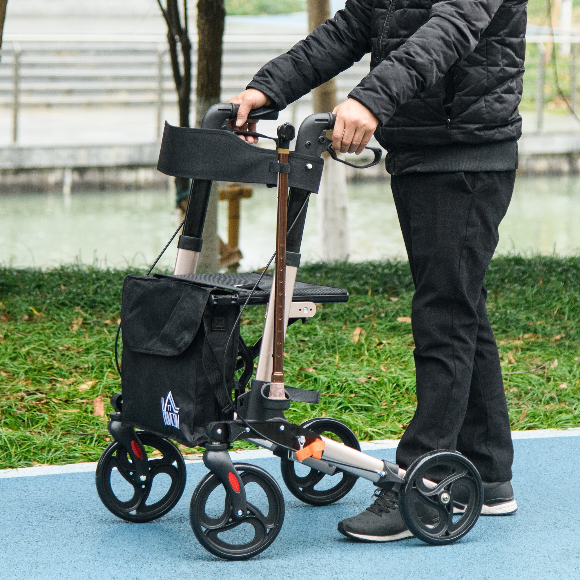 HOMCOM 4 Wheel Rollator with Seat and Back, Folding Mobility Walker with Carry Bag, Adjustable Height, Dual Brakes, Cane Holder, Lightweight Aluminium Walking Frame for Seniors and Disabled, Gold Tone - North Peak Garden Furniture