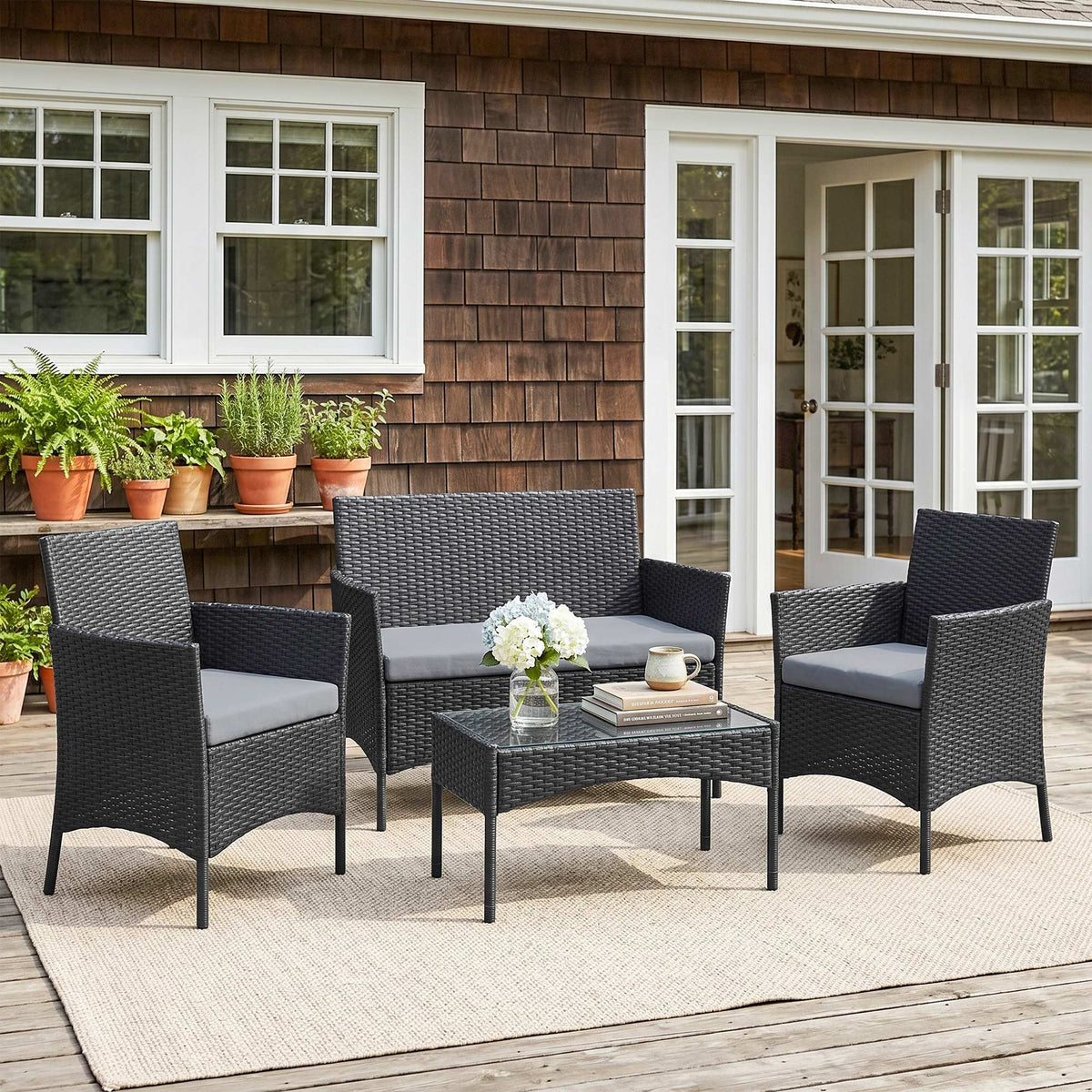 Outsunny 4 Piece Rattan Garden Furniture Sofa Set with Loveseat, Armchairs, Glass-Top Coffee Table and Cushions, Black