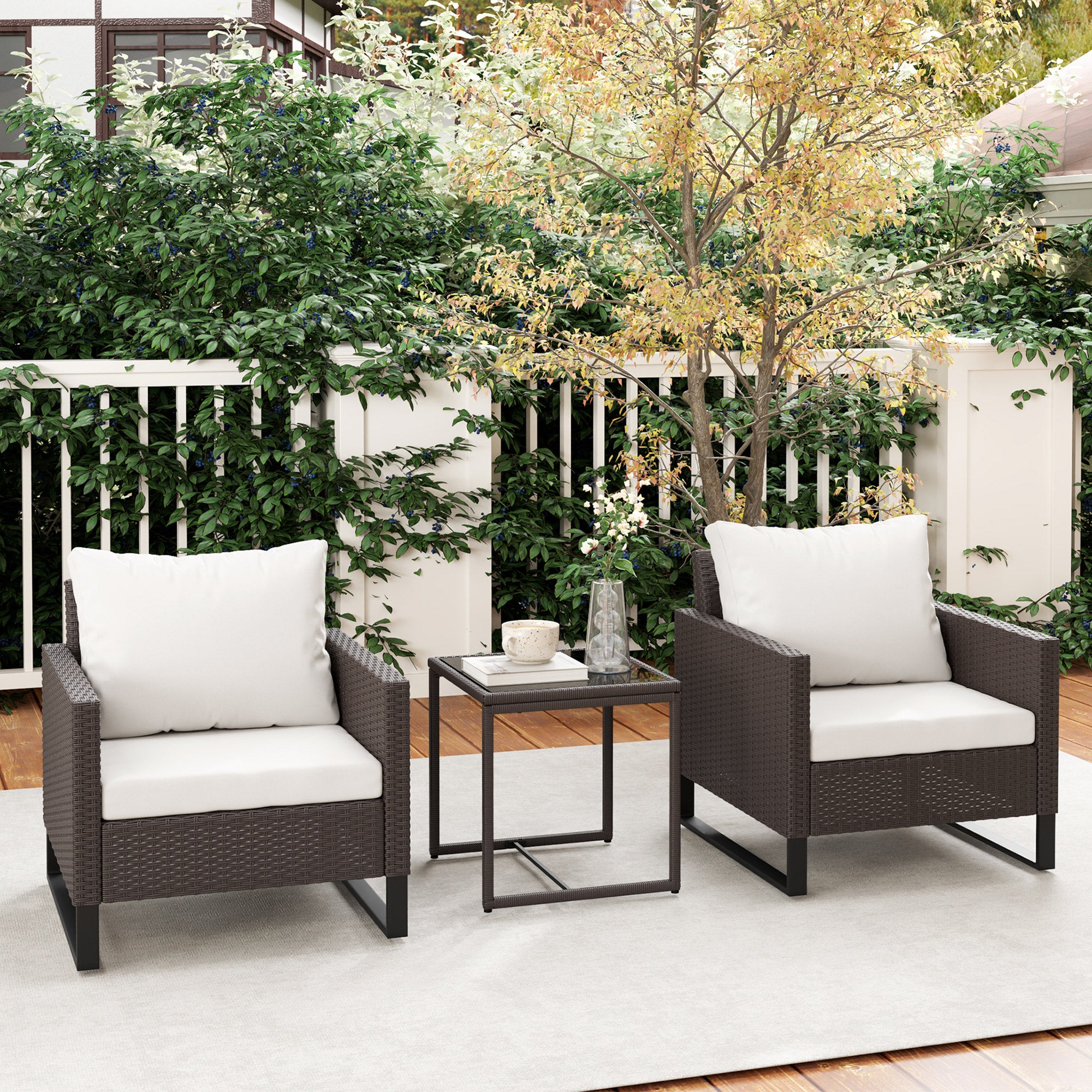 Outsunny 3 Pieces Rattan Bistro Set with 4 Cushions, Wicker Garden Furniture Set, Glass Top Coffee Table and Chairs for Outdoor Patio, Balcony, Terrace and Conservatory, Brown - North Peak Garden Furniture