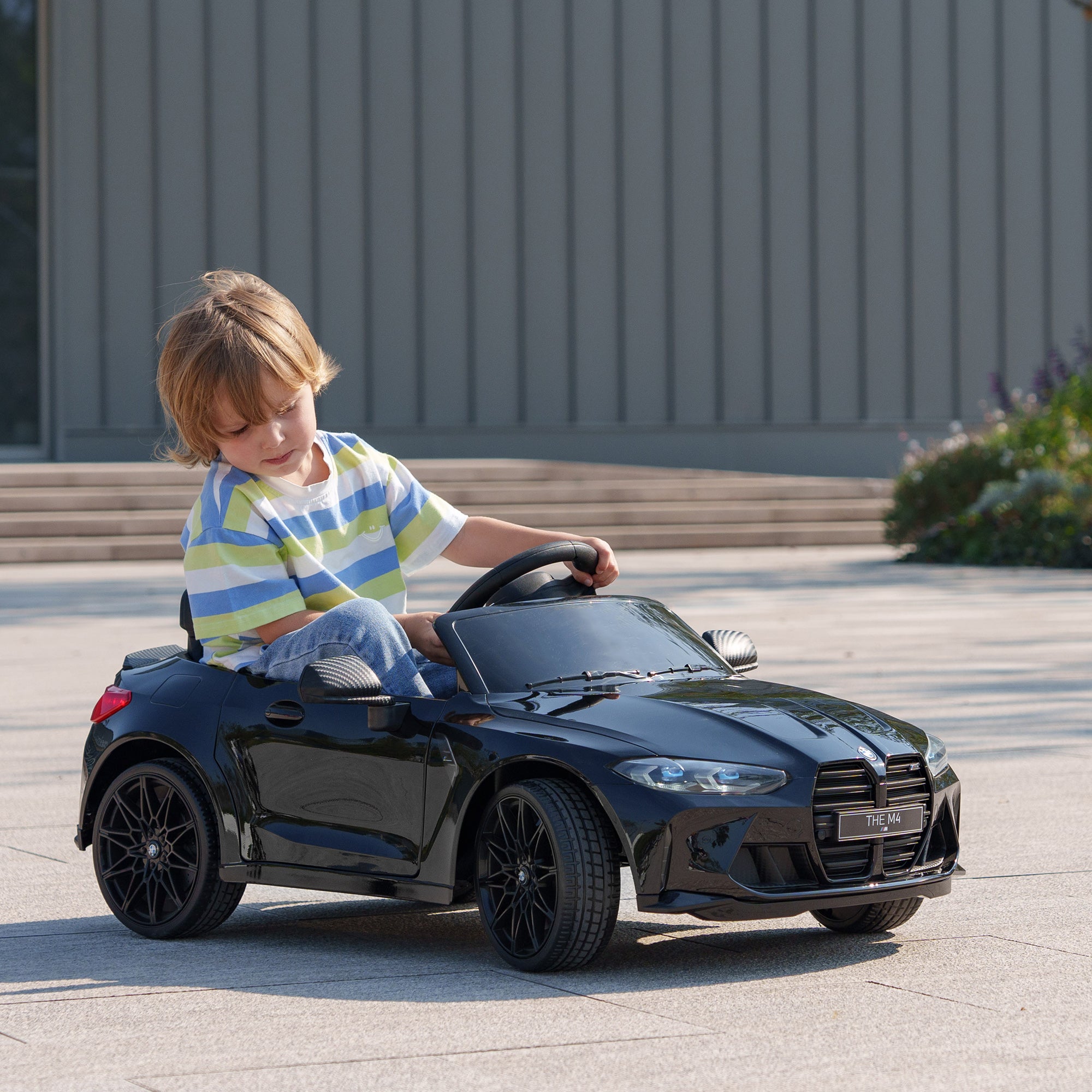 AIYAPLAY 12V BMW Licensed Kids Car, with Easy Transport, Remote Control, Suspension, Music, Horn, LED Lights, Black - North Peak Garden Furniture