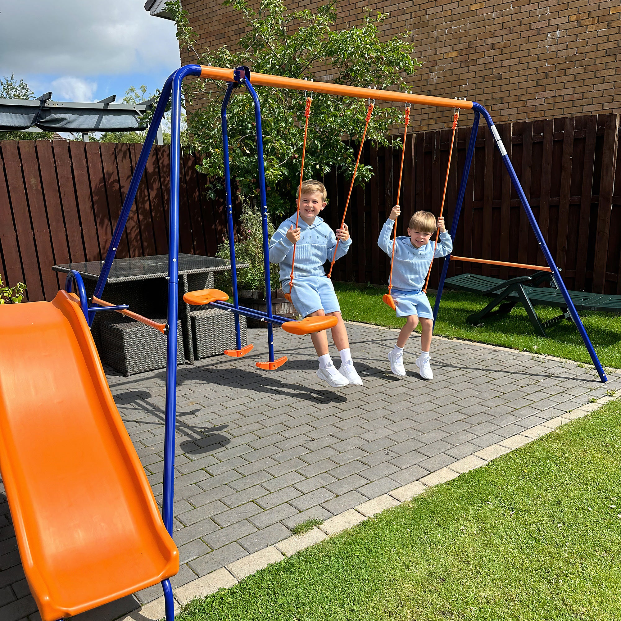 Outsunny Four-In-One Metal Garden Swing Set, with Double Swings, Glider, Slider, Ladder - Orange and Blue