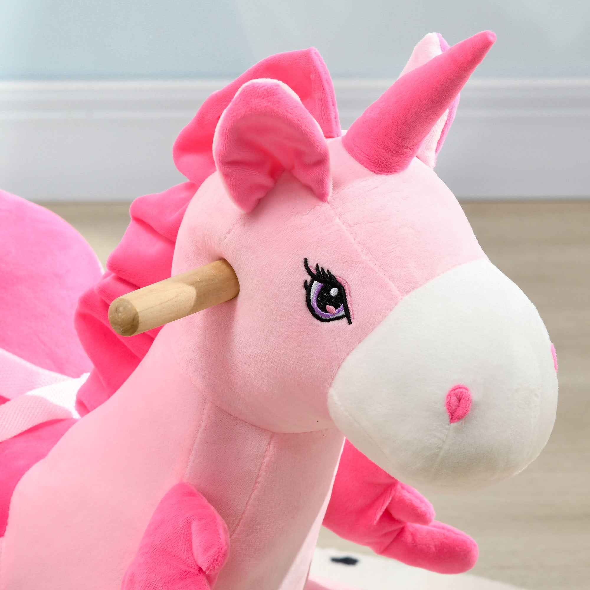 HOMCOM Kids Rocking Horse Ride on Unicorn with Songs, Wooden Base, Seatbelt, for Ages 18-36 Months, Pink - North Peak Garden Furniture