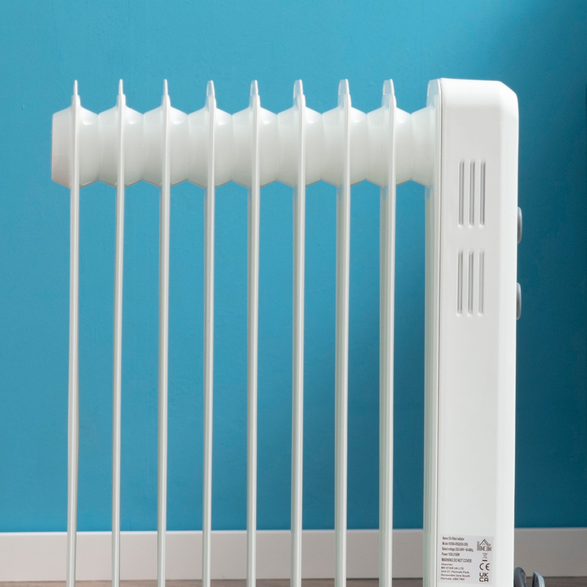 HOMCOM 2000W Oil Filled Radiator, 9 Fin, Portable Electric Heater with 3 Heat Settings, Safety Cut-Off and Wheels, White - North Peak Garden Furniture