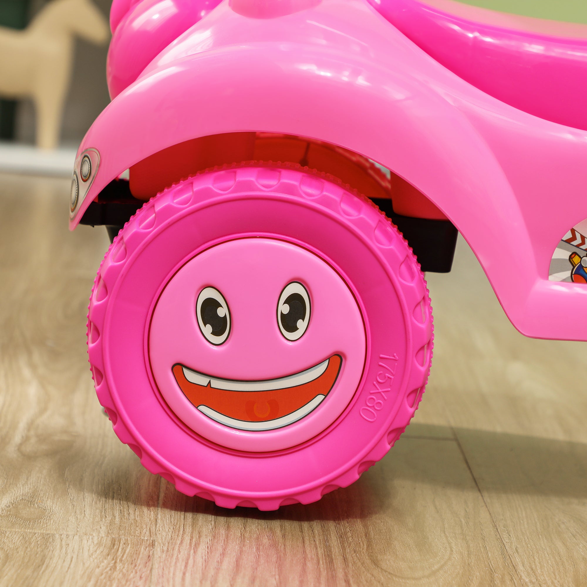 AIYAPLAY Foot to Floor oddler Ride on Toy w/ Music, Light, Horn, Under Seat Storage, Anti-Over-Backwards Device, Pink